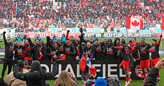 Mar 27, 2022; Toronto, Ontario, CAN;  Canada players celebrate a win over Jamaica  at BMO Field to clinch qualification for the 2022 FIFA World Cup. Mandatory Credit: Dan Hamilton-USA TODAY Sports